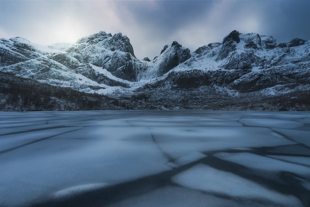 Sunlit Winter Mountain Lake by David Martin Castan — canvas wall art