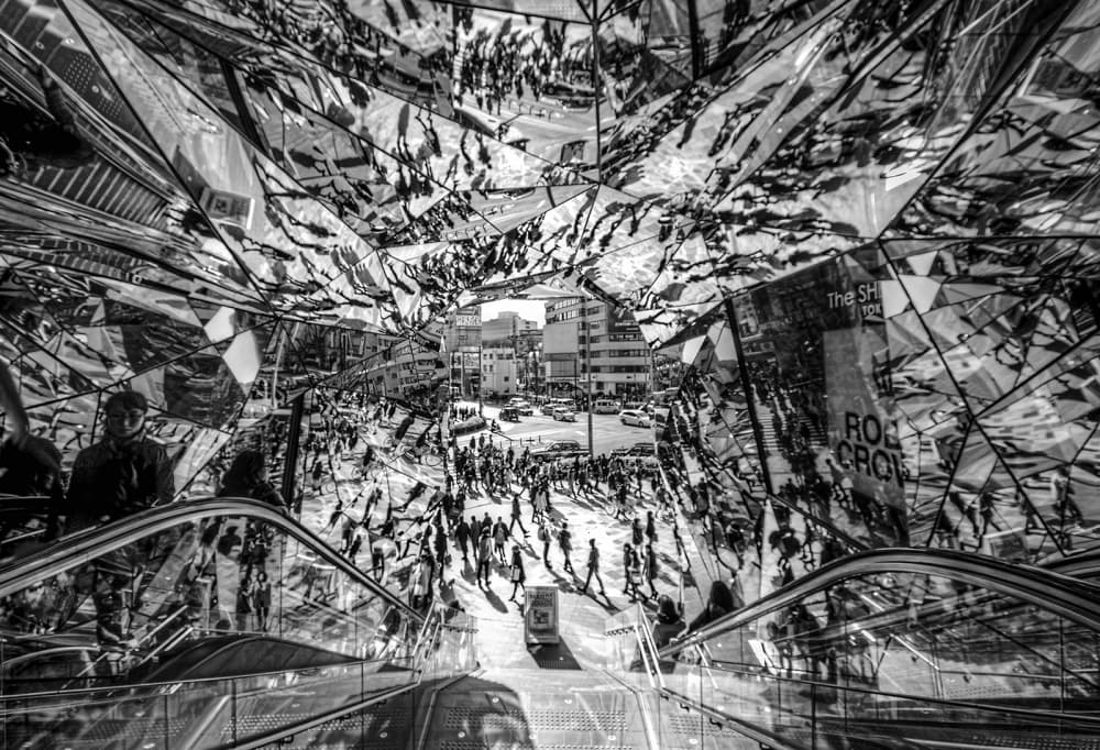 Urban Escalator Reflections by Tomoshi Hara — canvas wall art