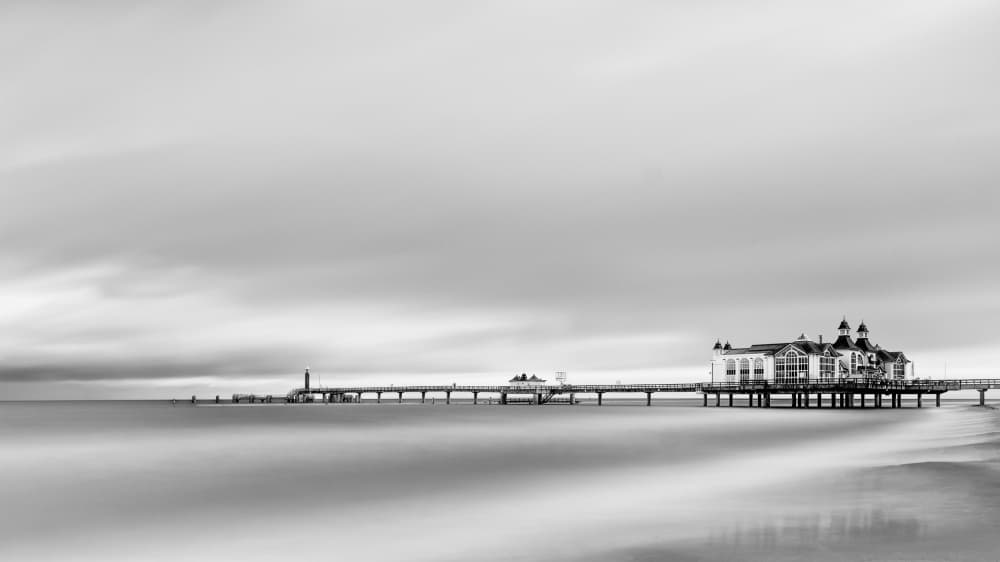 Pier Over Calm Sea by Rolf Endermann — canvas wall art