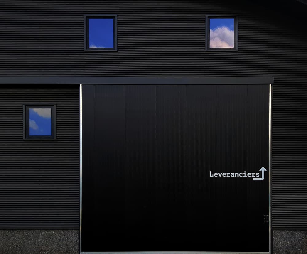 Minimalist Black Facade by Huib Limberg — canvas wall art
