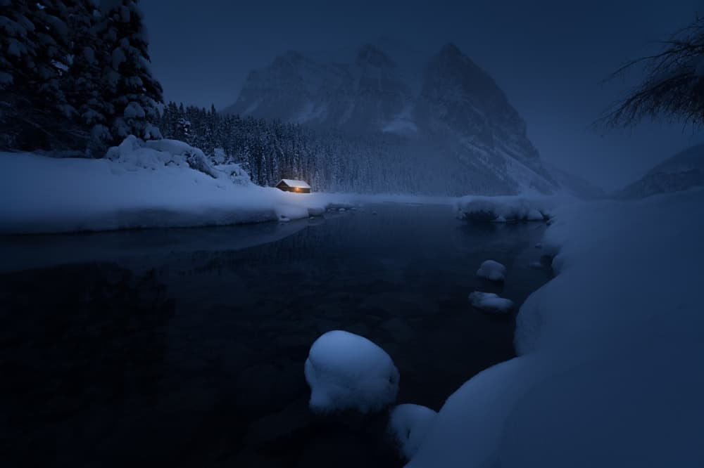 Cozy Winter Lake Cabin by Yongnan Li (李永男) — canvas wall art