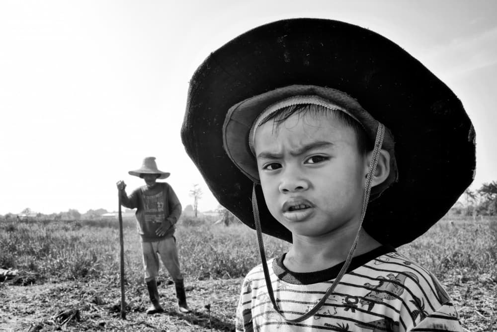 Farm Boy In Hat by Kieron Long — canvas wall art