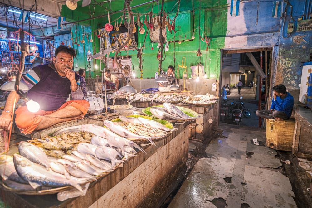Fish Market Vendor by Subhajit Das — canvas wall art