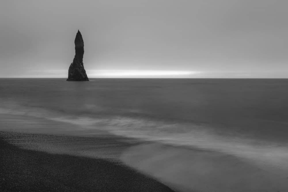 Serene Black Beach Stack by Jure Kravanja — canvas wall art
