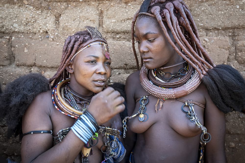 Mutwa girls at Oncocua market, southern Angola by Elena Molina — canvas wall art