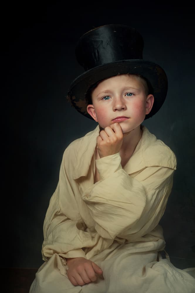 Pensive Boy in Top Hat by Monika Vanhercke — canvas wall art