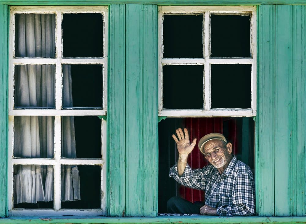 Smiling Man's Welcome by durmusceylan — canvas wall art