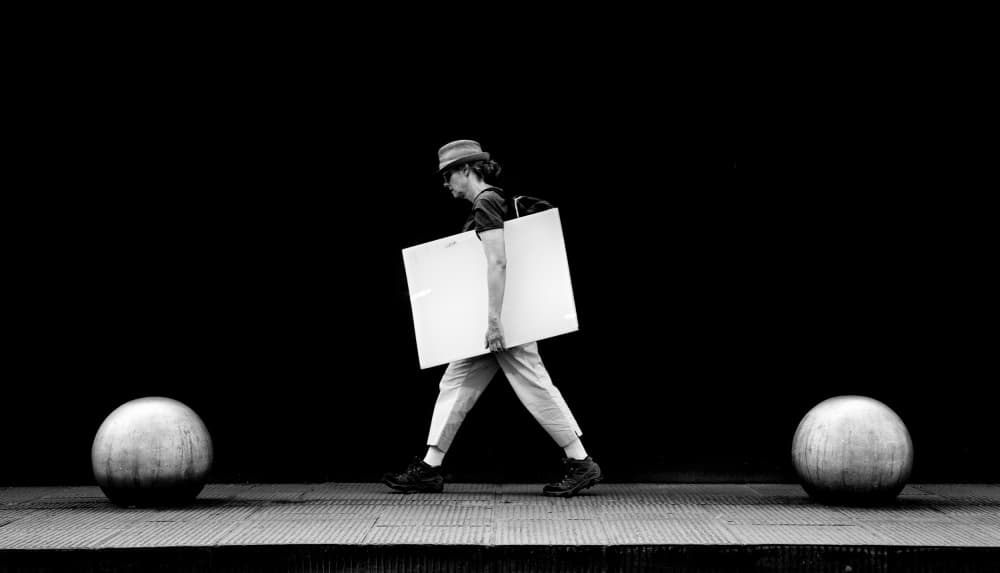 Man Carrying Canvas by Francesco Martinelli — canvas wall art
