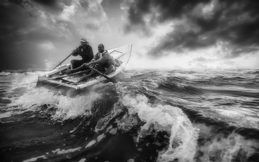 Men Rowing Rough Waters by Charlaine Gerber — canvas wall art