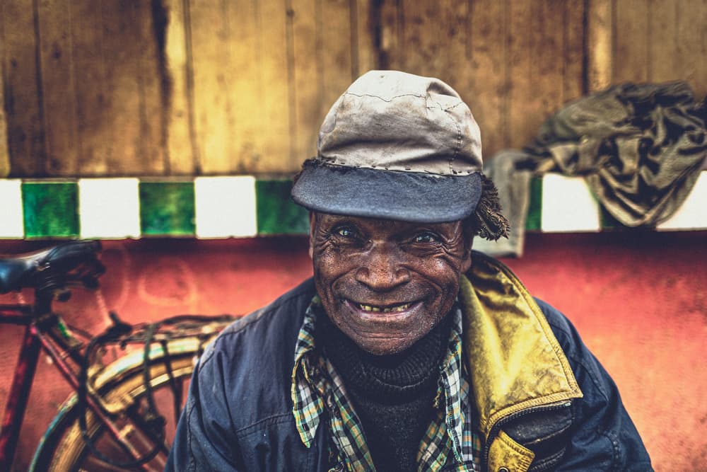 Genuine Smile Portrait by Marco Tagliarino — canvas wall art