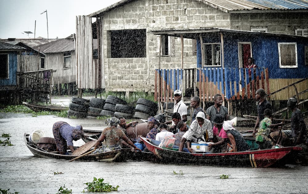 Rainy Village Boats by Elena Molina — canvas wall art