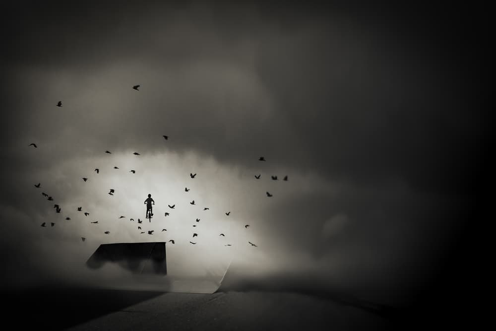 Dark Sky Bike Jump by Nic Keller — canvas wall art