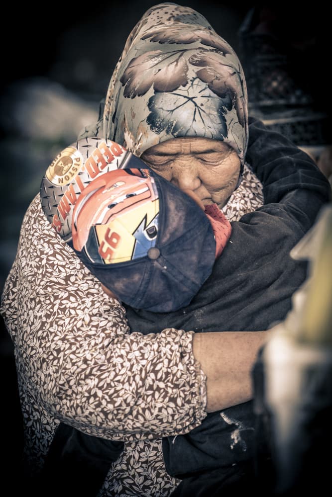 Tender Family Embrace by Eyal Alcalay — canvas wall art