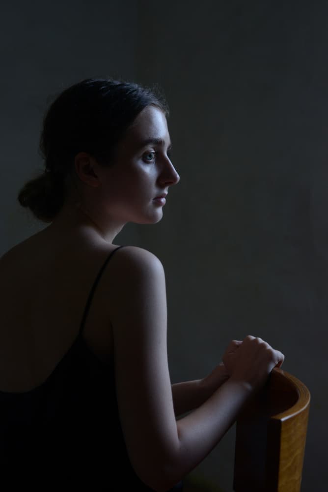 Pensive Woman Profile by Małgorzata Masarz — canvas wall art