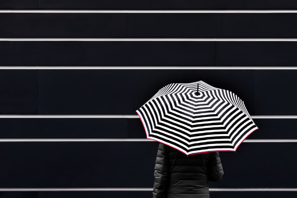 Solitary Striped Umbrella by Karin Kilb — canvas wall art