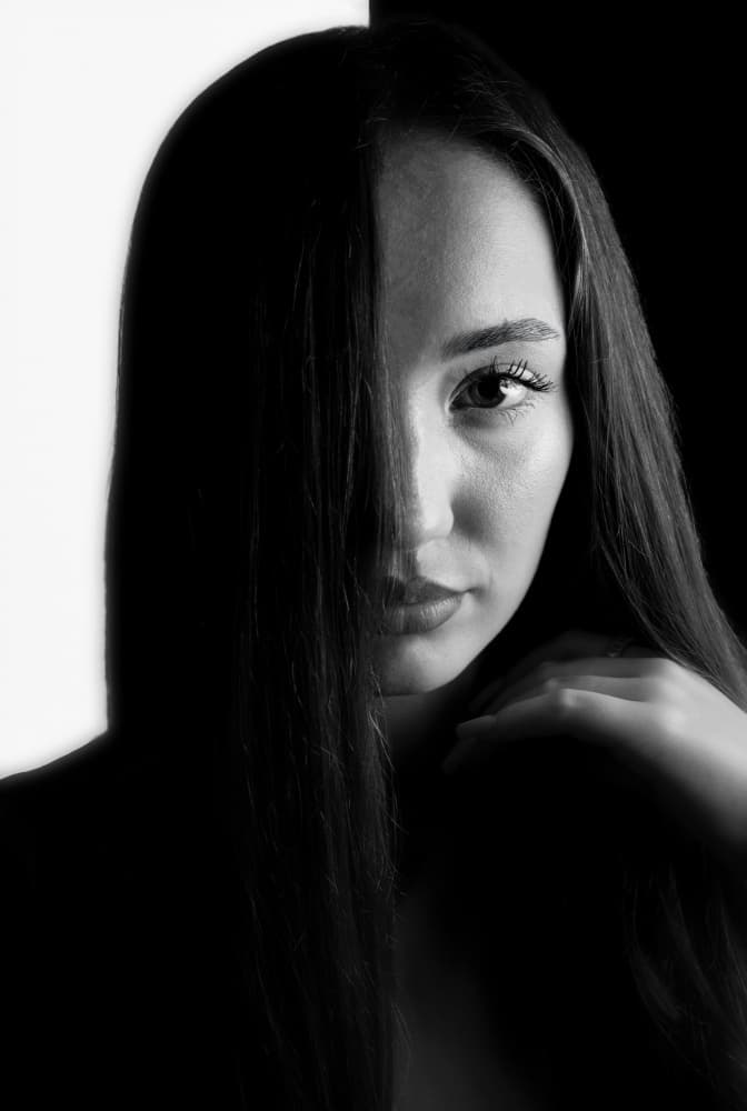 Dramatic Shadowed Woman by Grigore Roibu — canvas wall art