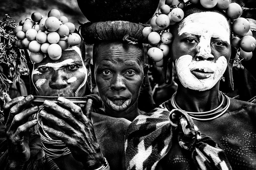Painted Tribal Faces by Joxe Inazio Kuesta Garmendia — canvas wall art