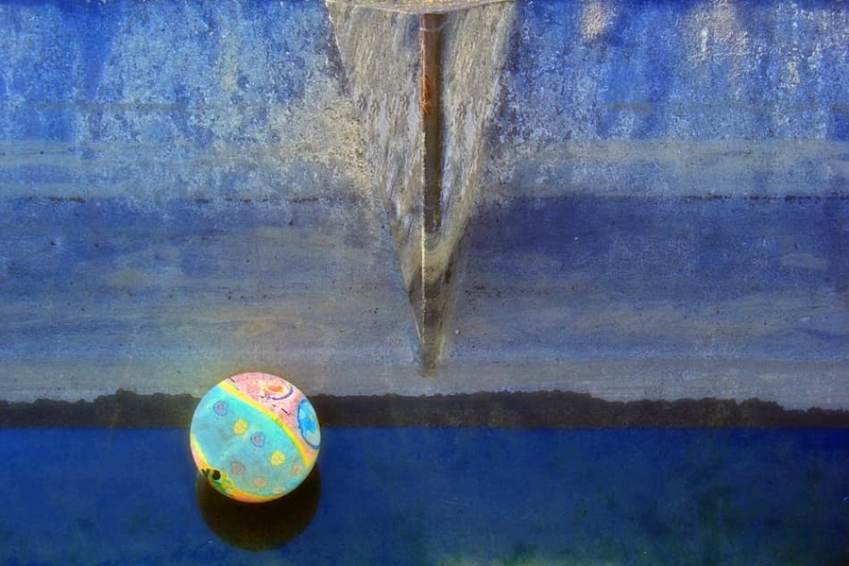 Blue Boat Water Reflection by Jure Kravanja — canvas wall art