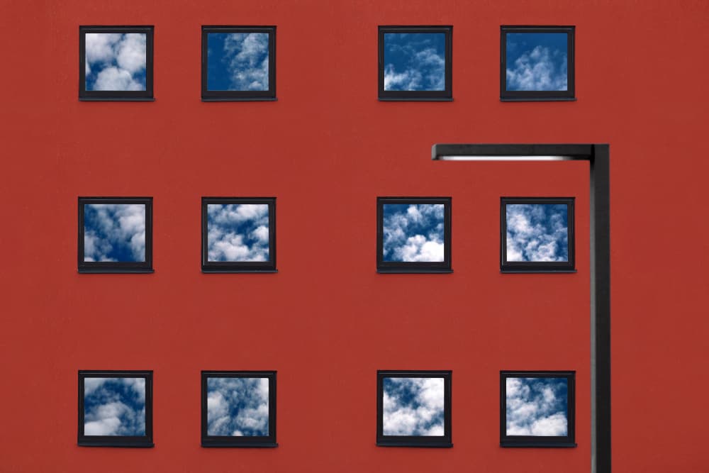 Red Building Blue Sky by Hans-Wolfgang Hawerkamp — canvas wall art