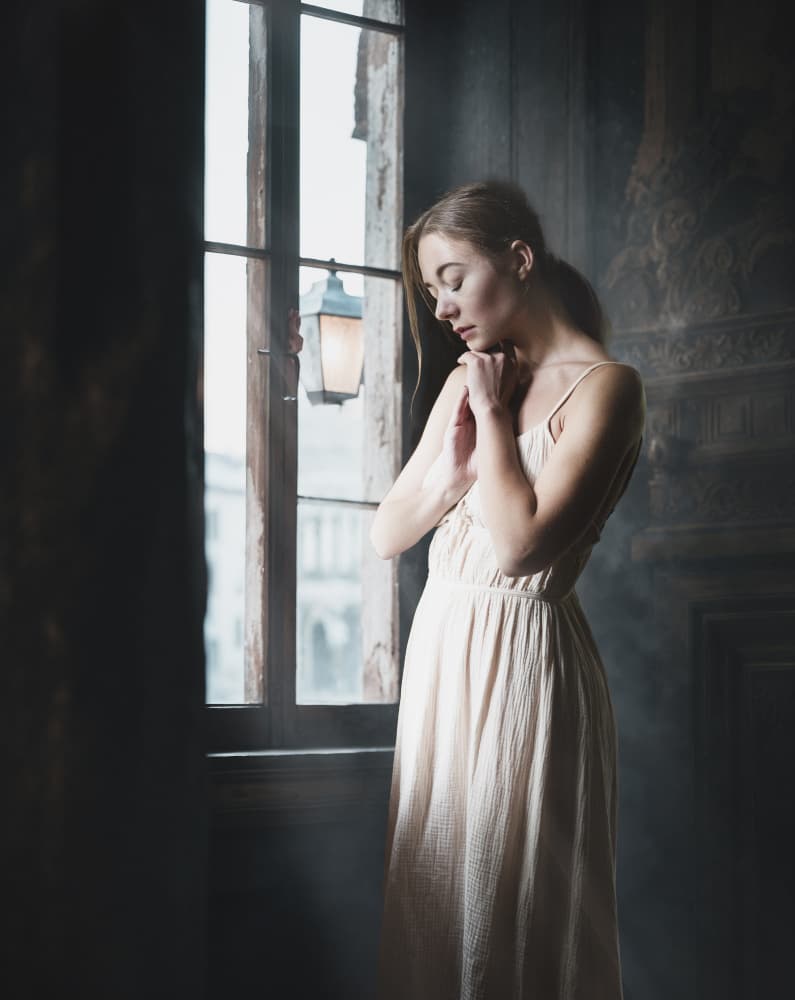 Pensive Woman By Window by Christian Kurz — canvas wall art