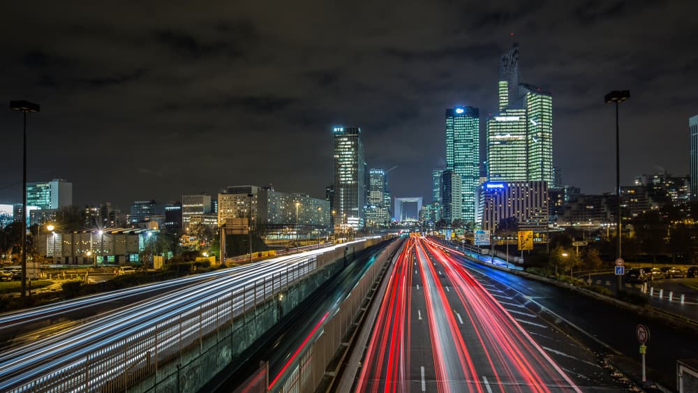 Urban Night Light Trails by Wim Denijs — canvas wall art
