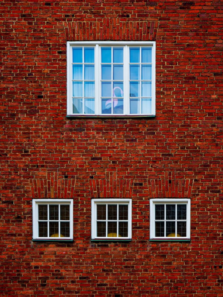Red Brick Windows by Marius Surleac — canvas wall art