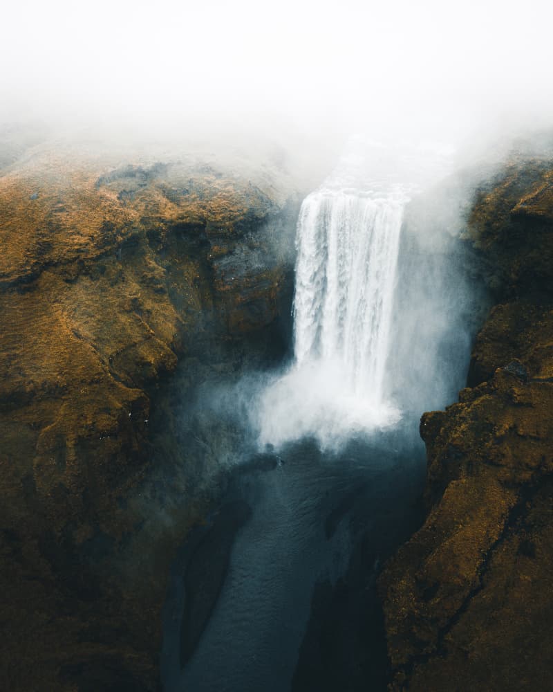 Misty Canyon Waterfall by Witold Ziomek — canvas wall art