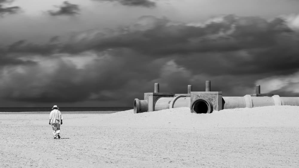 Lone Figure Concrete Pipes by Luc Vangindertael (laGrange) — canvas wall art