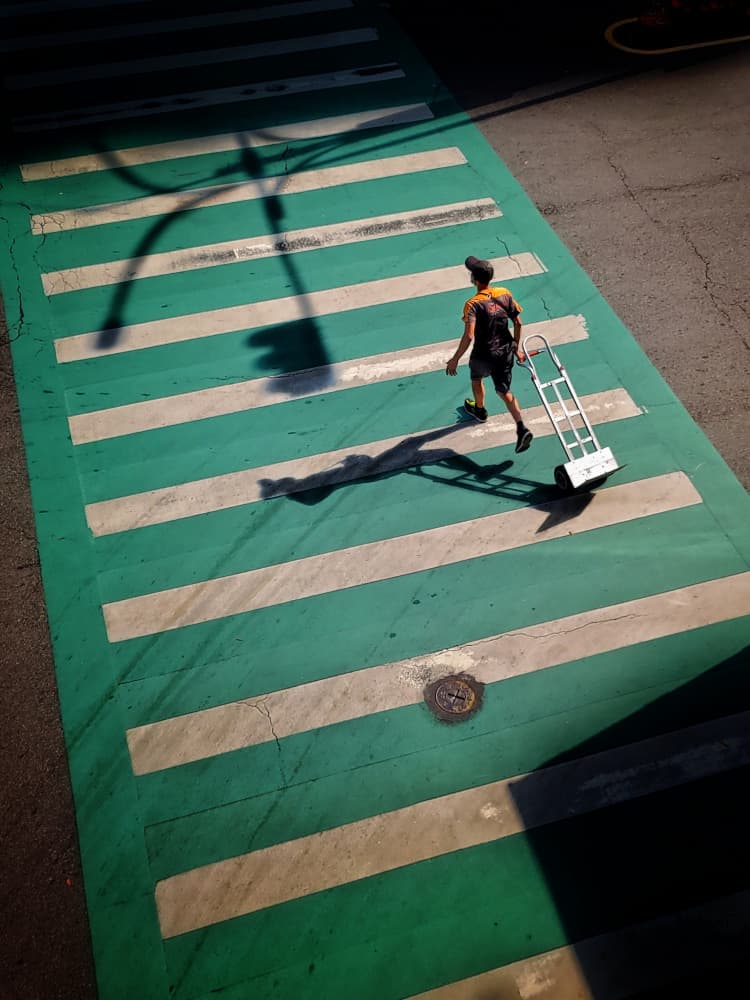 Man Crosswalk Shadows by Yi-Tang Wang — canvas wall art