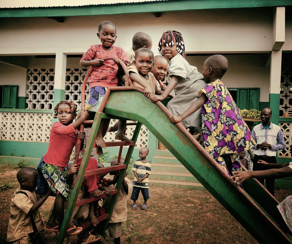 Joyful Children Playing by Elena Molina — canvas wall art