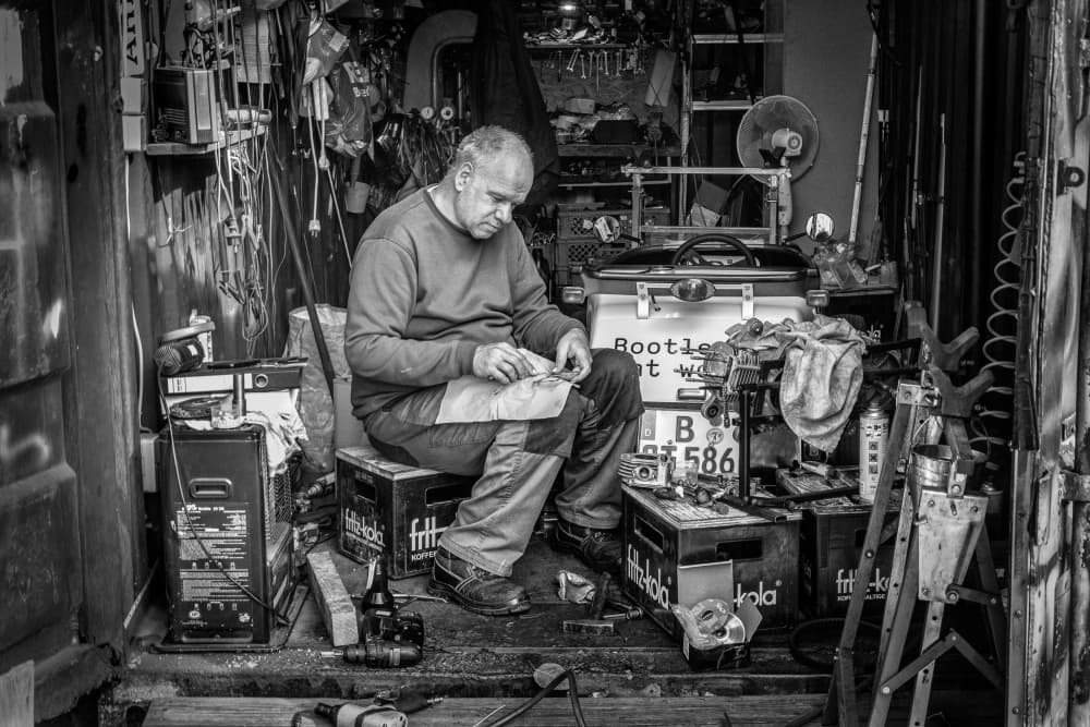 Focused Workshop Worker by Holger Goehler — canvas wall art