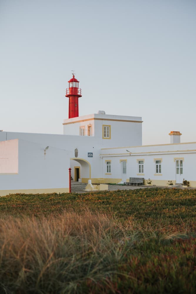 Red Coastal Lighthouse by Claudia Casal — canvas wall art