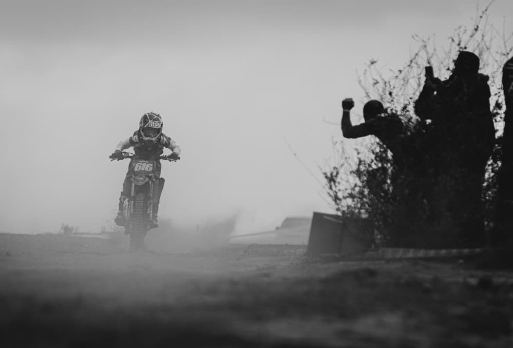 Dusty Motocross Action by Nir Amos — canvas wall art