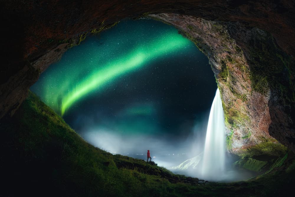 Northern Lights Cave Waterfall by Yuan Cui — canvas wall art