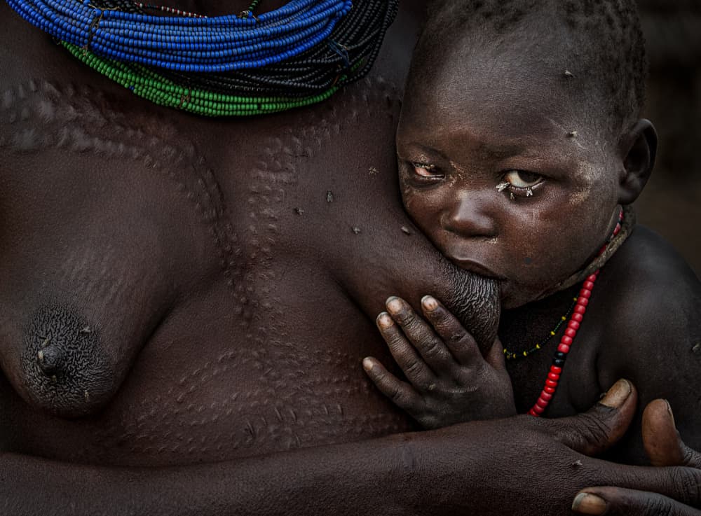 Tribal Mother Child by Joxe Inazio Kuesta Garmendia — canvas wall art