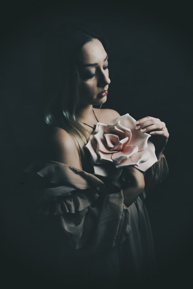 Pensive Woman with Rose by Christian Kurz — canvas wall art