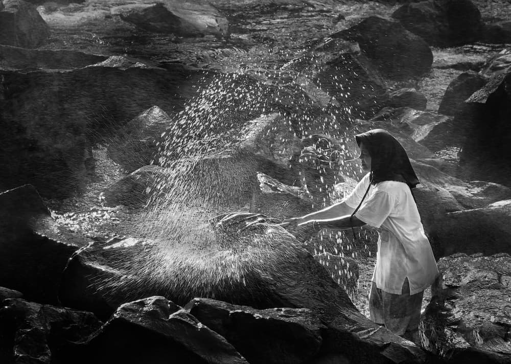 Woman Splashing Water by Angela Muliani Hartojo — canvas wall art