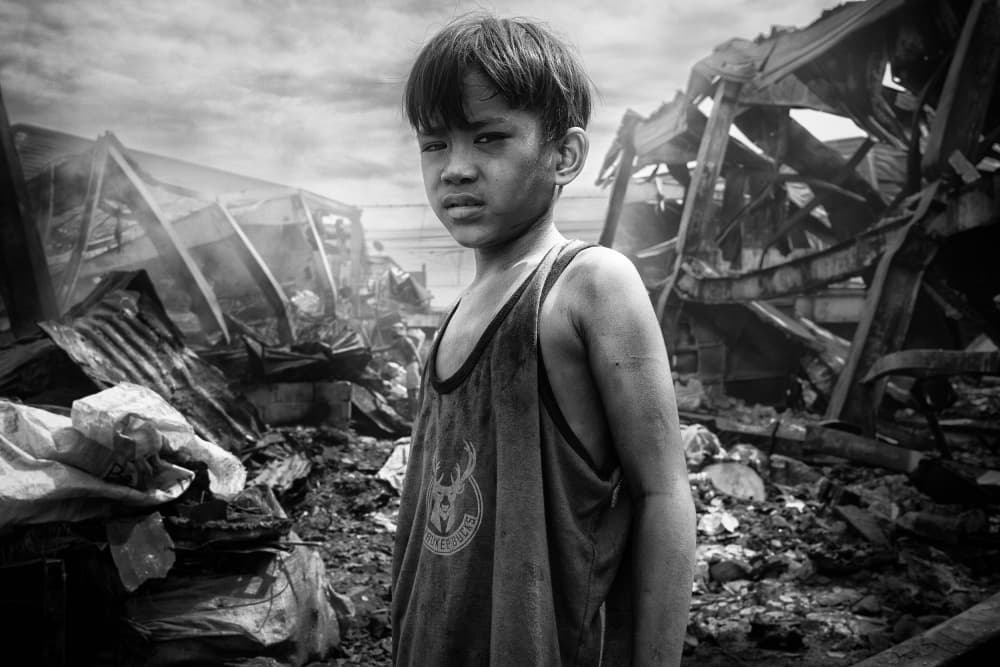 Serious Boy in Rubble by Shinji Isobe — canvas wall art