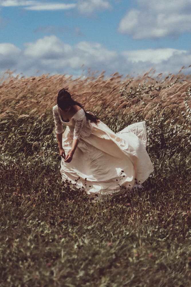 Woman in Tall Grass by Kurosaki Sangan — canvas wall art