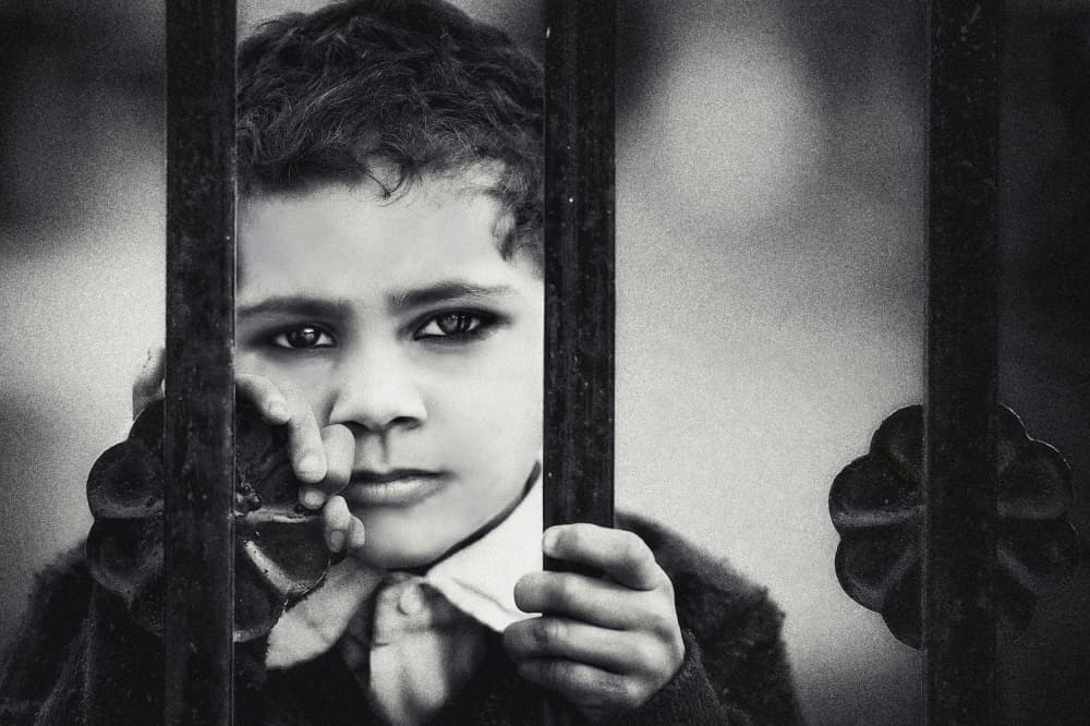 Child's Poignant Gaze by Piet Flour — canvas wall art