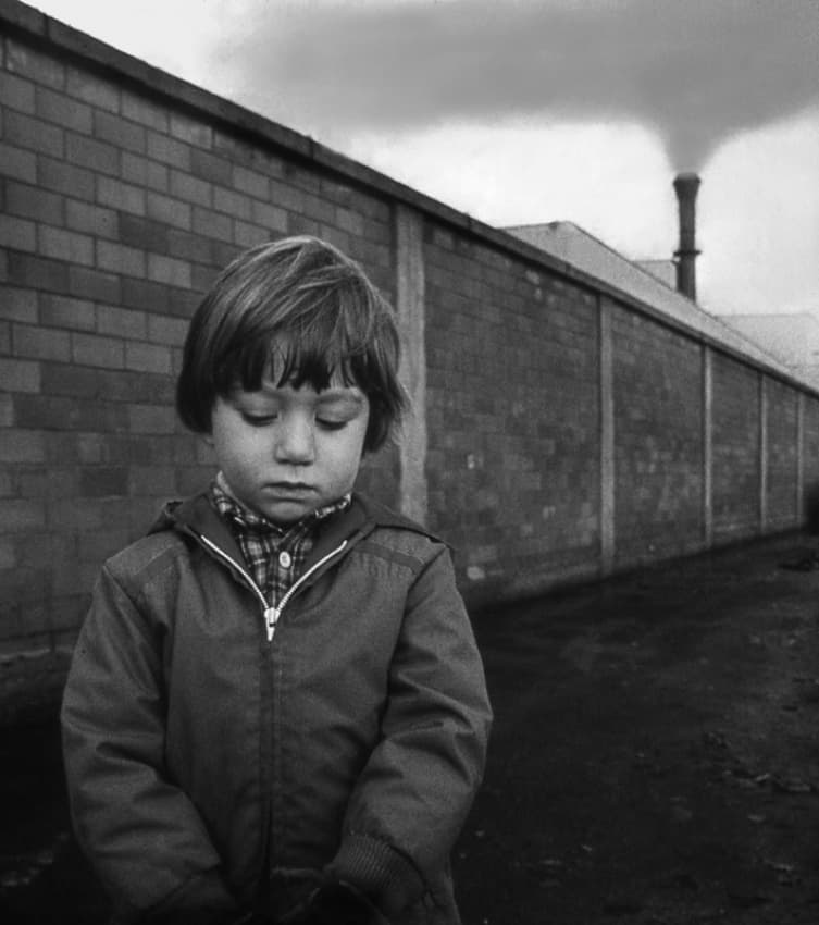 Pensive Boy, Factory Smoke by Luciano Caturegli — canvas wall art
