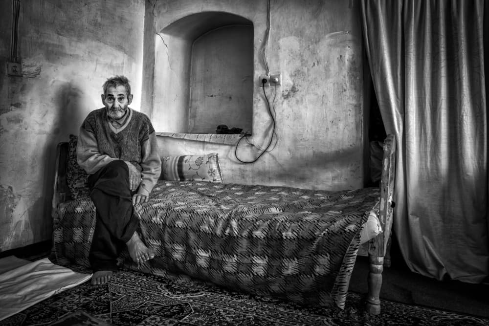 Elderly Man In Solitude by Mohammadreza Momeni — canvas wall art