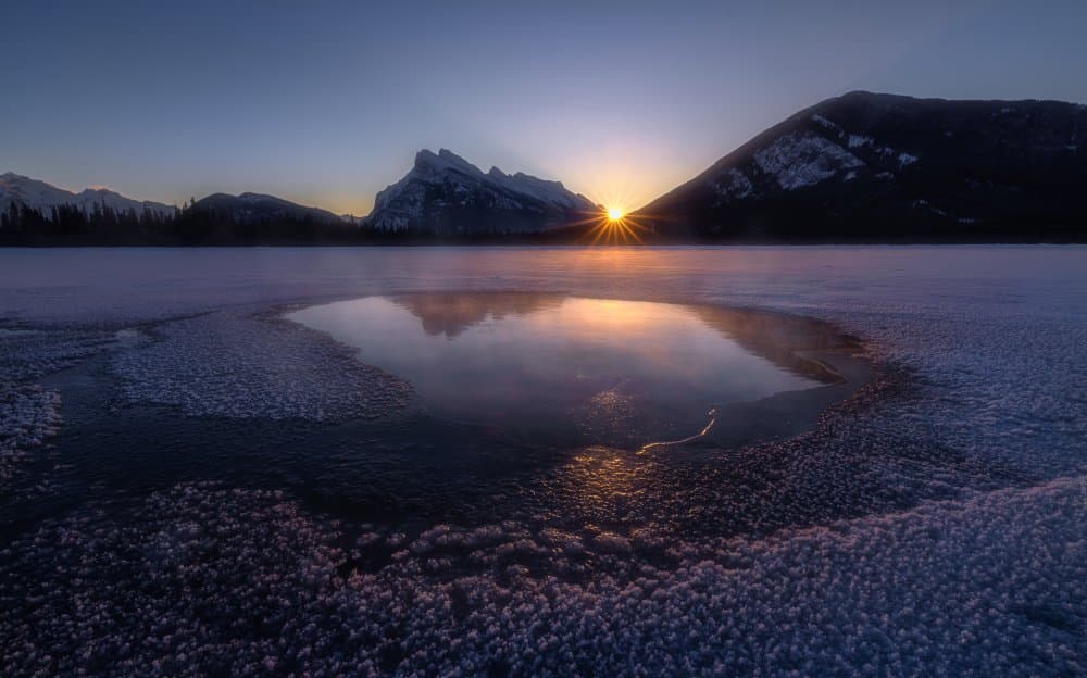 Frozen Lake Sunrise by Jenny L. Zhang — canvas wall art