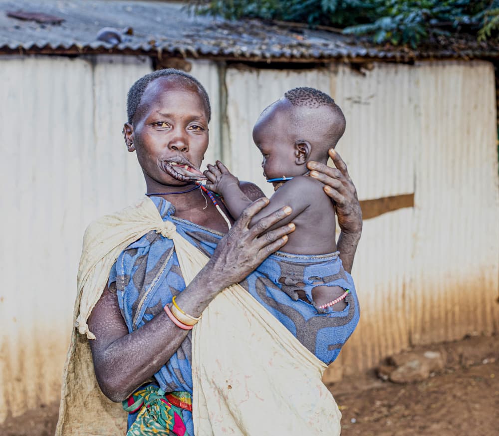 Mursi Mother and Child by Iris Wiener — canvas wall art