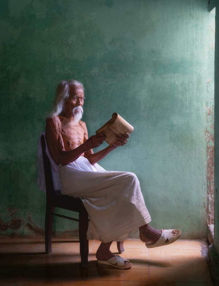 Serene Man Reading Scroll by Antoni Figueras — canvas wall art