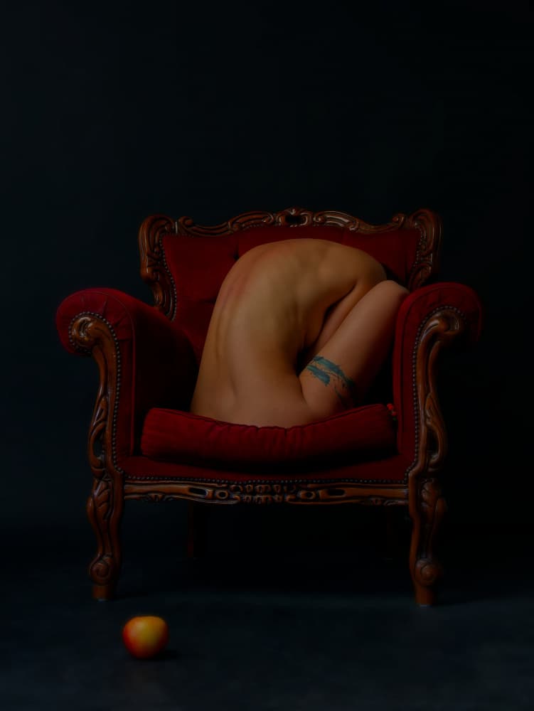 Curled Nude Red Armchair by Marius Surleac — canvas wall art