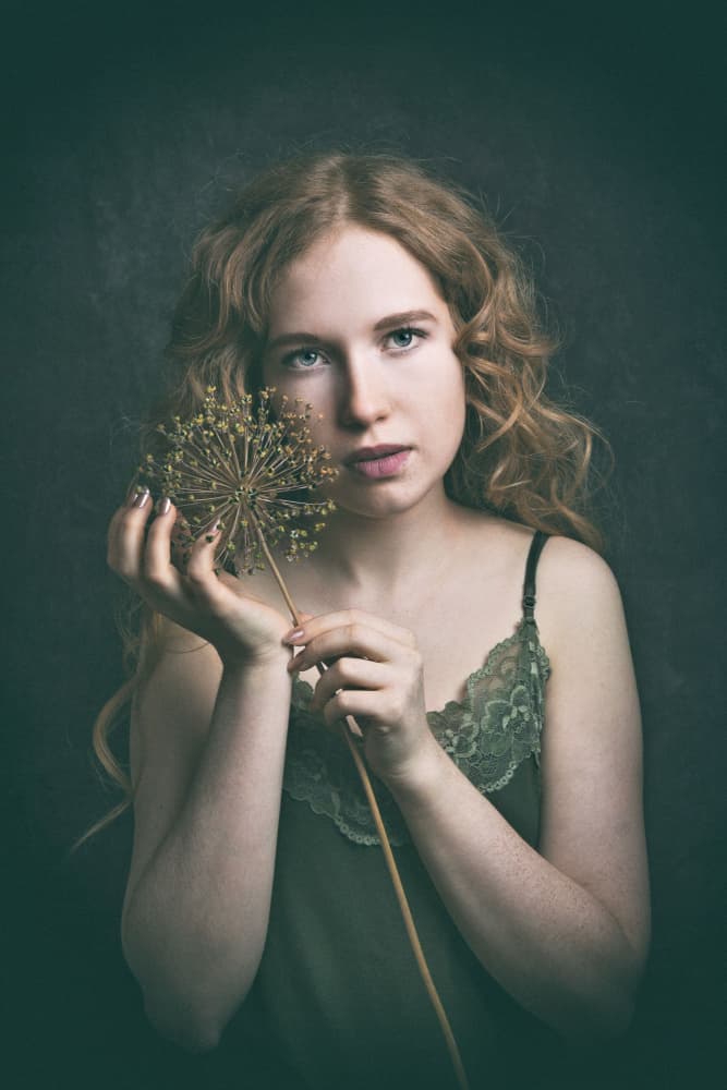 Pensive Girl With Flower by Ruth Franke — canvas wall art