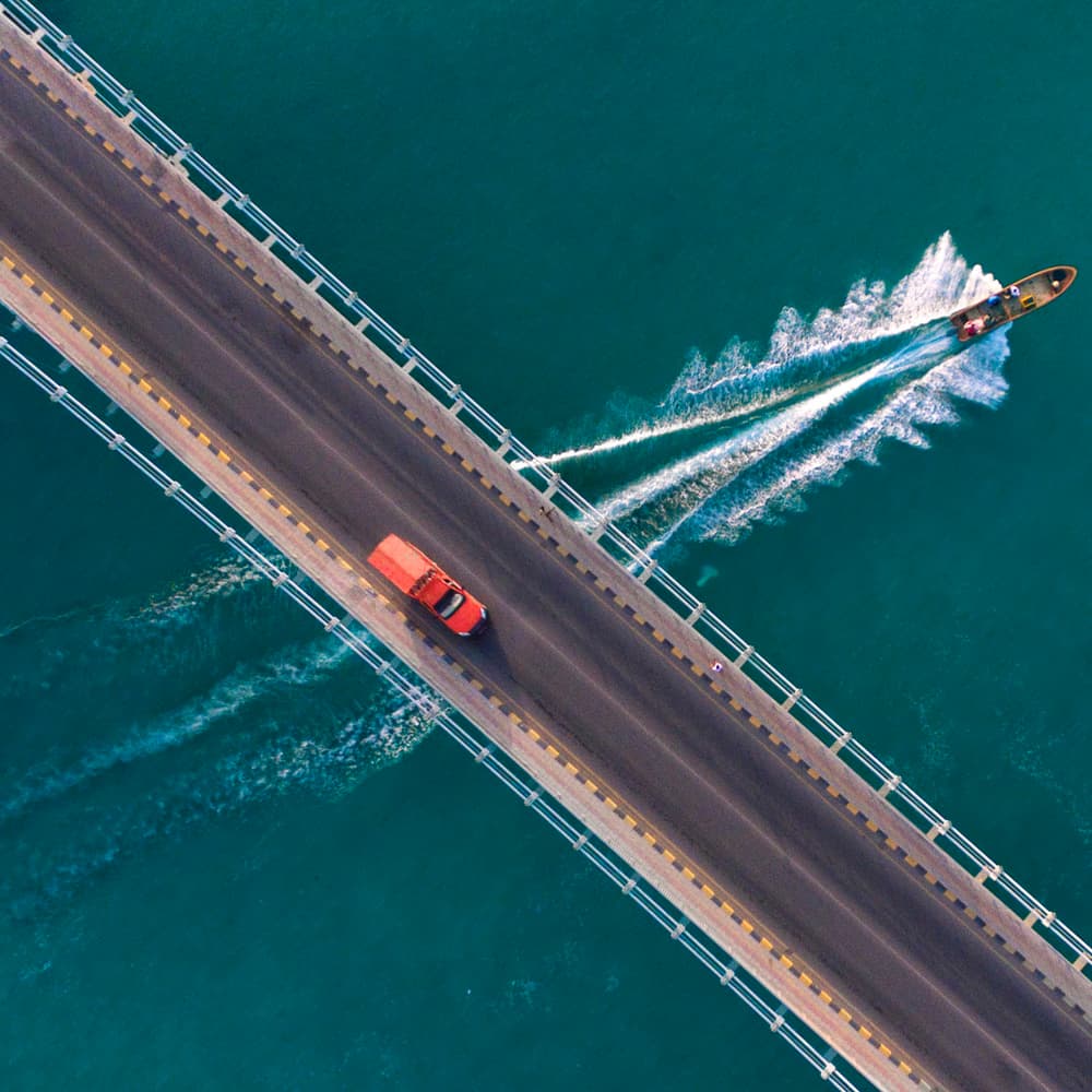 Aerial Bridge Boat Car by Haitham AL Farsi — canvas wall art