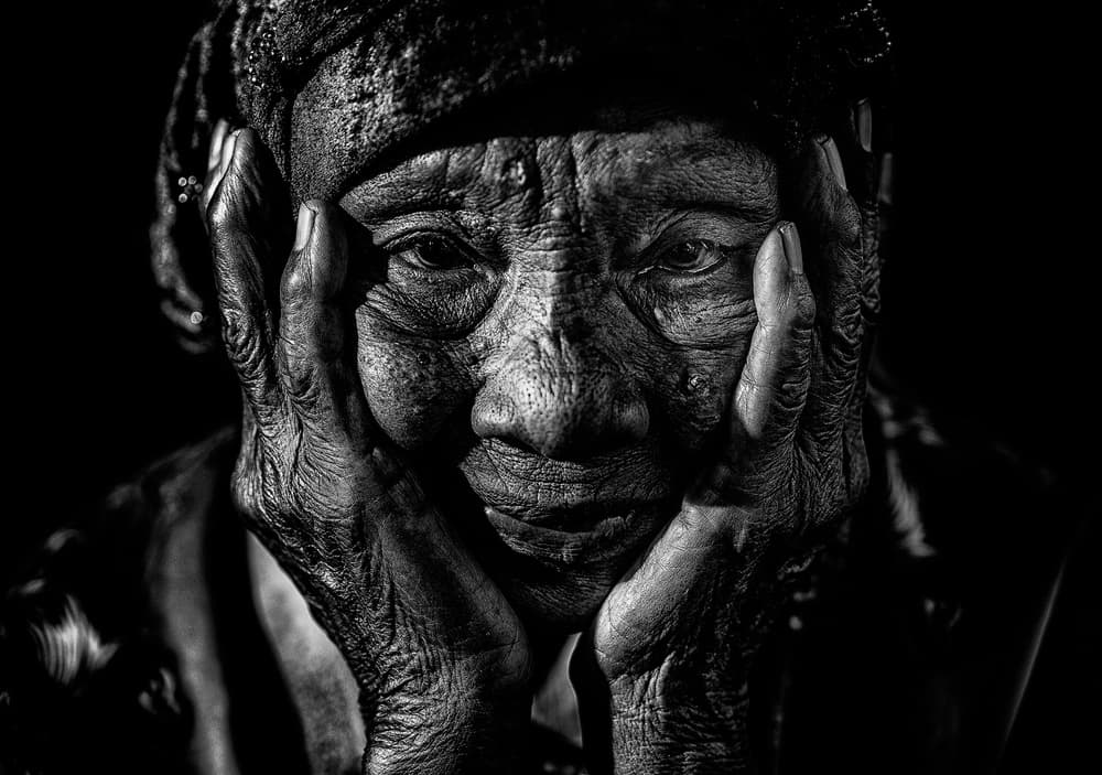 Elderly Woman's Gaze by Andi Halil — canvas wall art