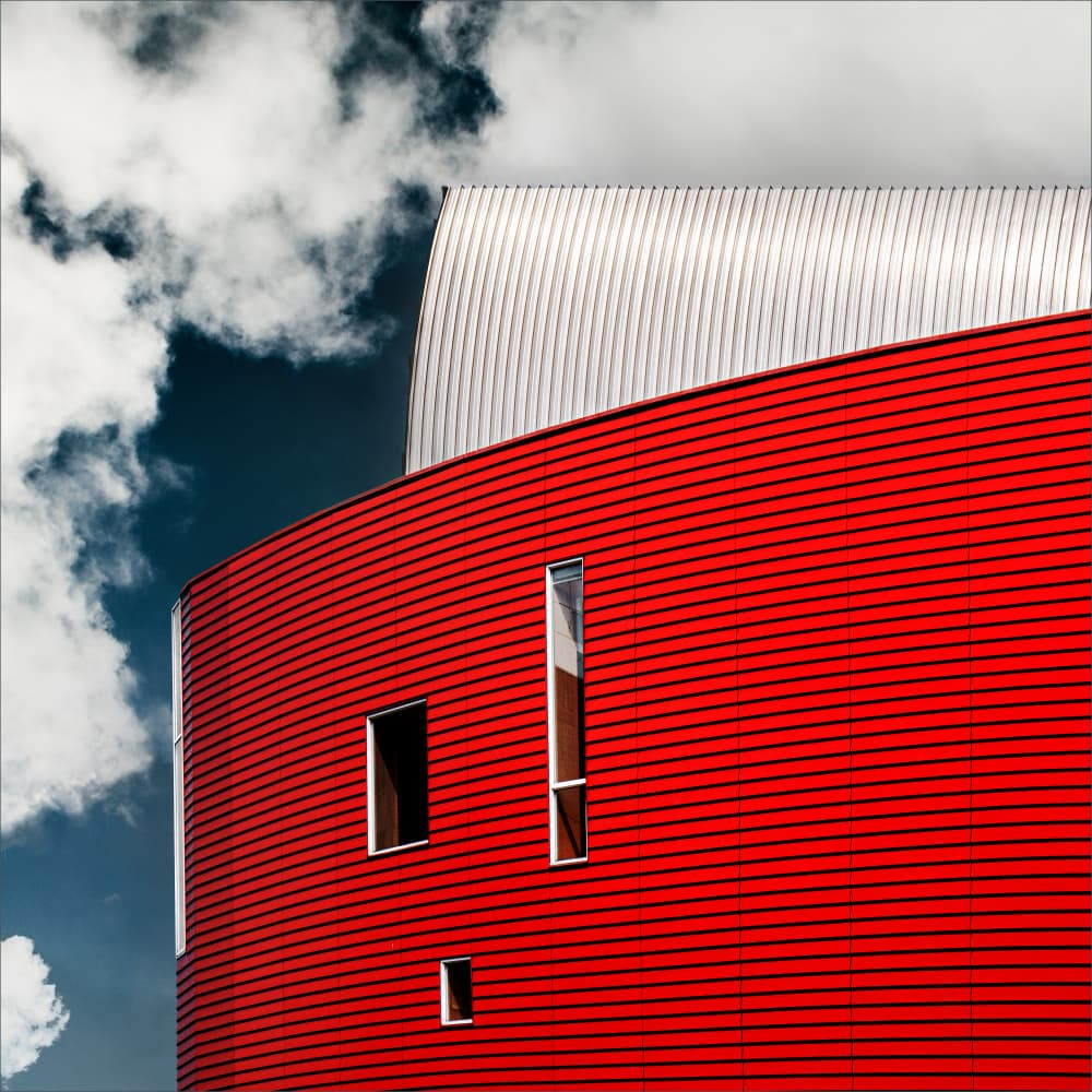 Vibrant Red Building by Gilbert Claes — canvas wall art